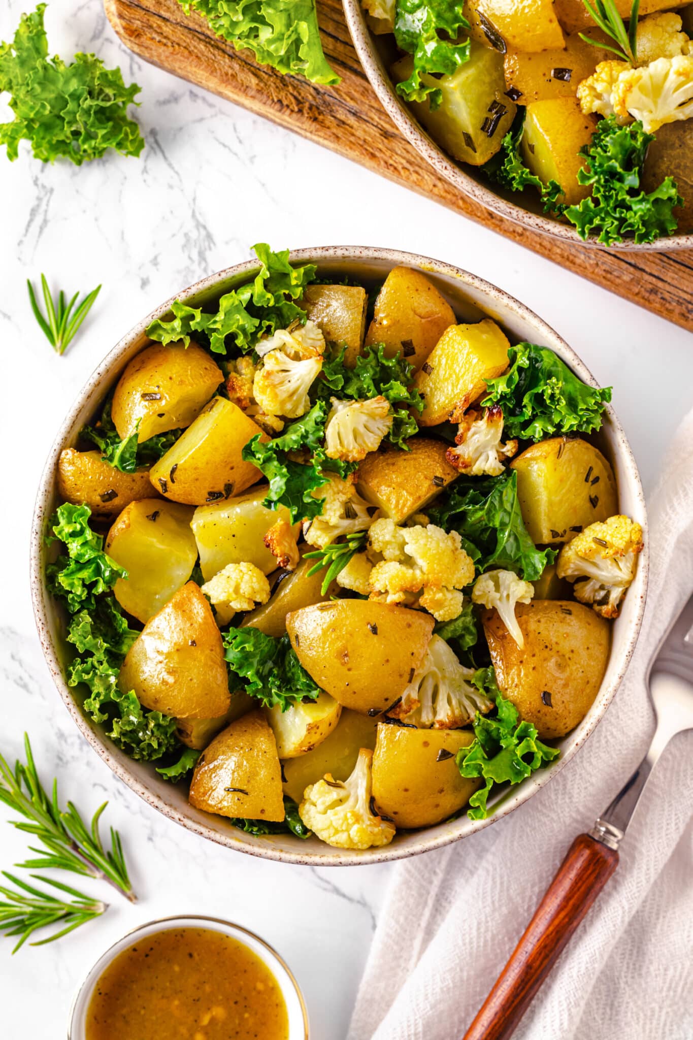 roasted potatoes with fresh kale and cauliflower.