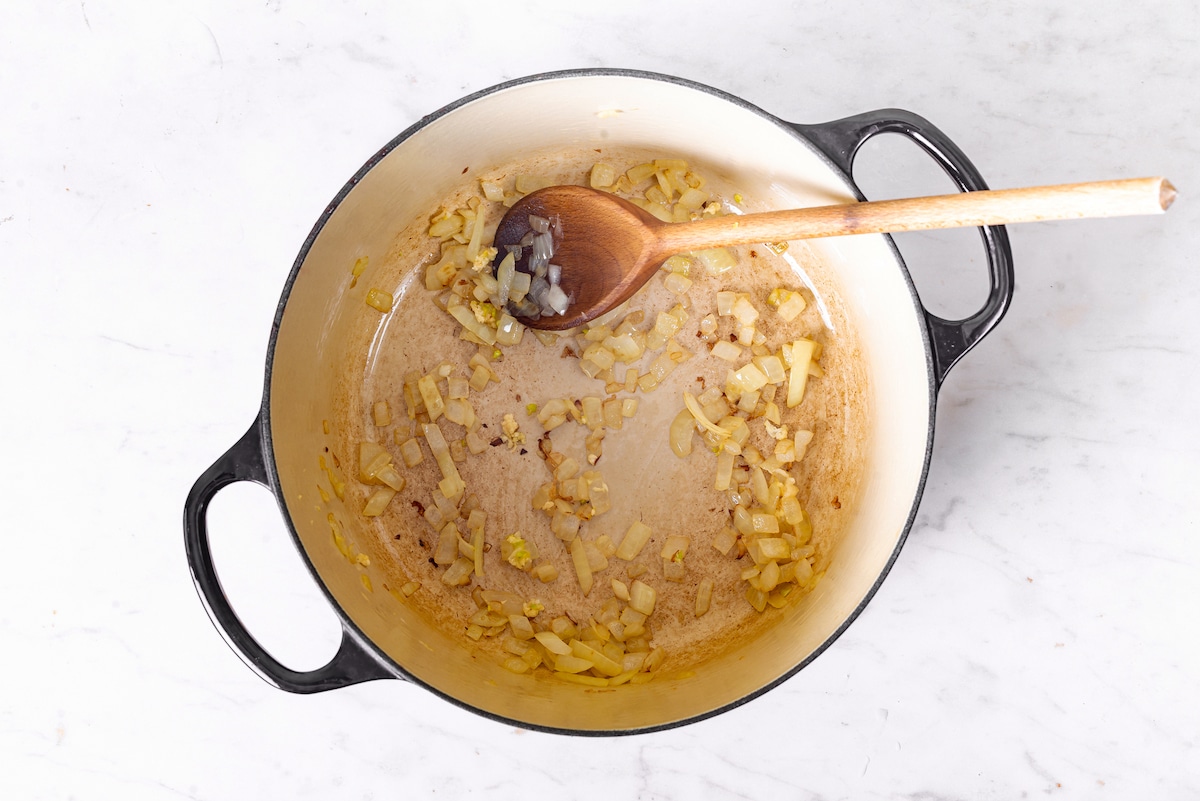 sautéing chopped onion and garlic in a black cast iron.