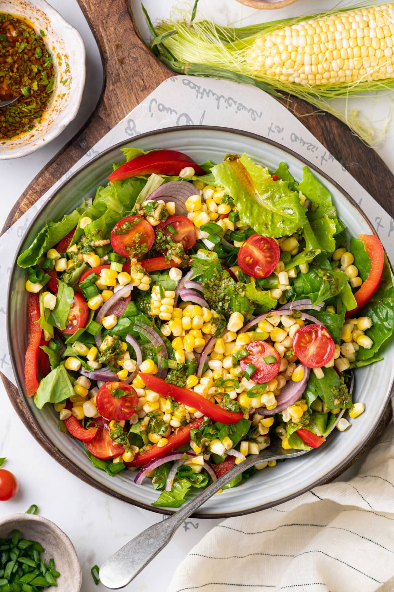 smokey corn salad with spoon 1331x2000