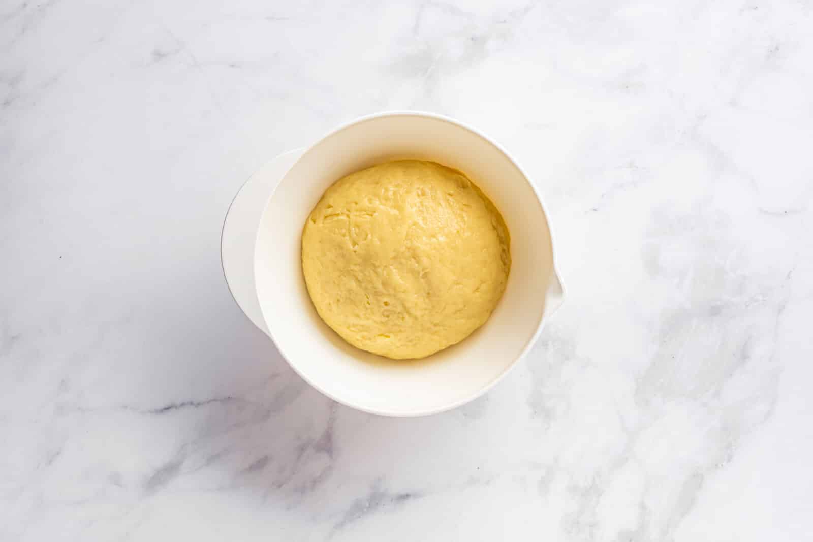 Dough for sweet winter trees in a white bowl.