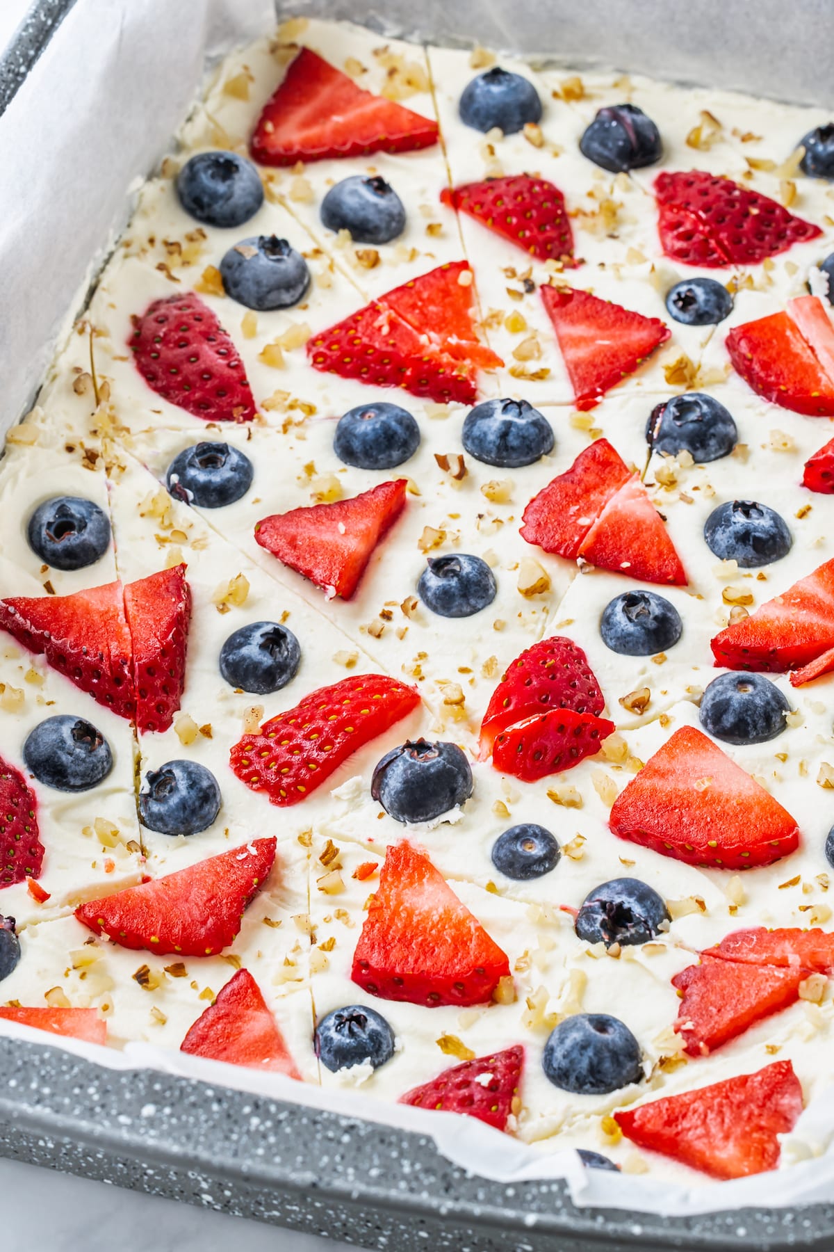 Yogurt bark with berries in pan